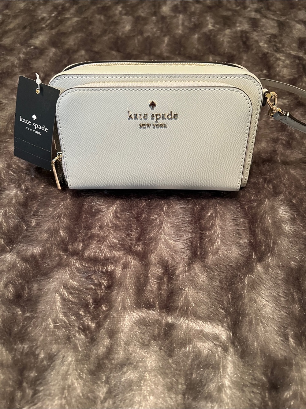Kate Spade grey crossbody bag with silver hardware